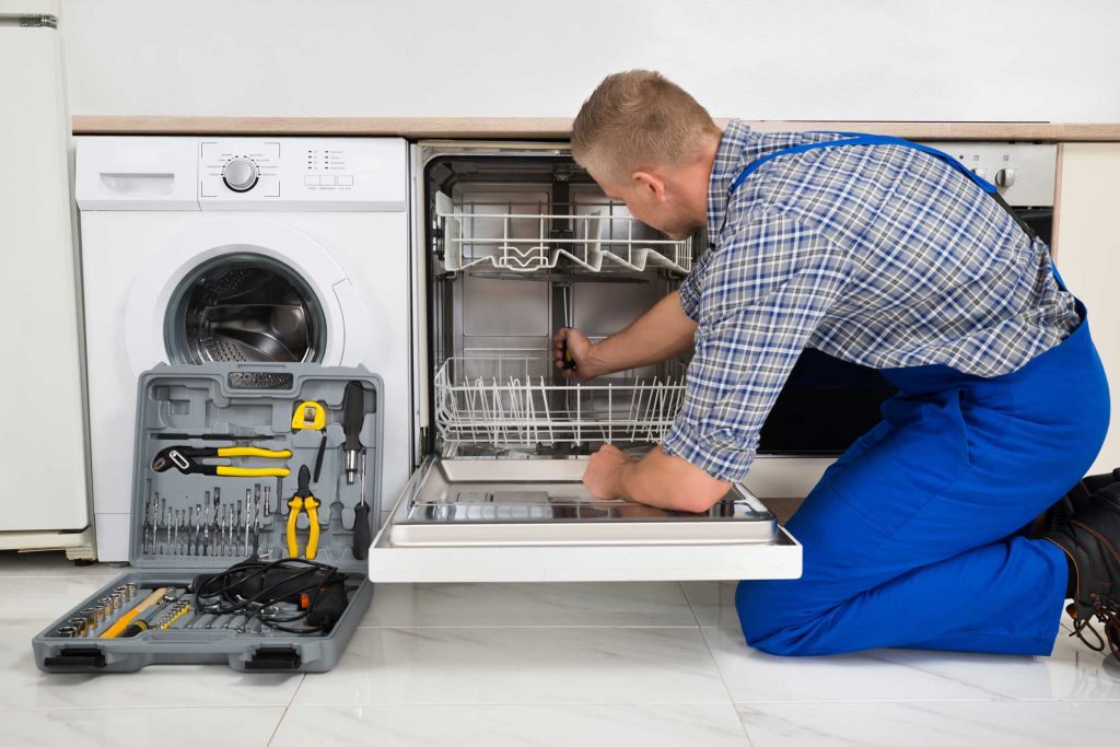 technician fixing a dishwasher repair charlotte