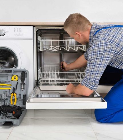 technician fixing a dishwasher repair charlotte